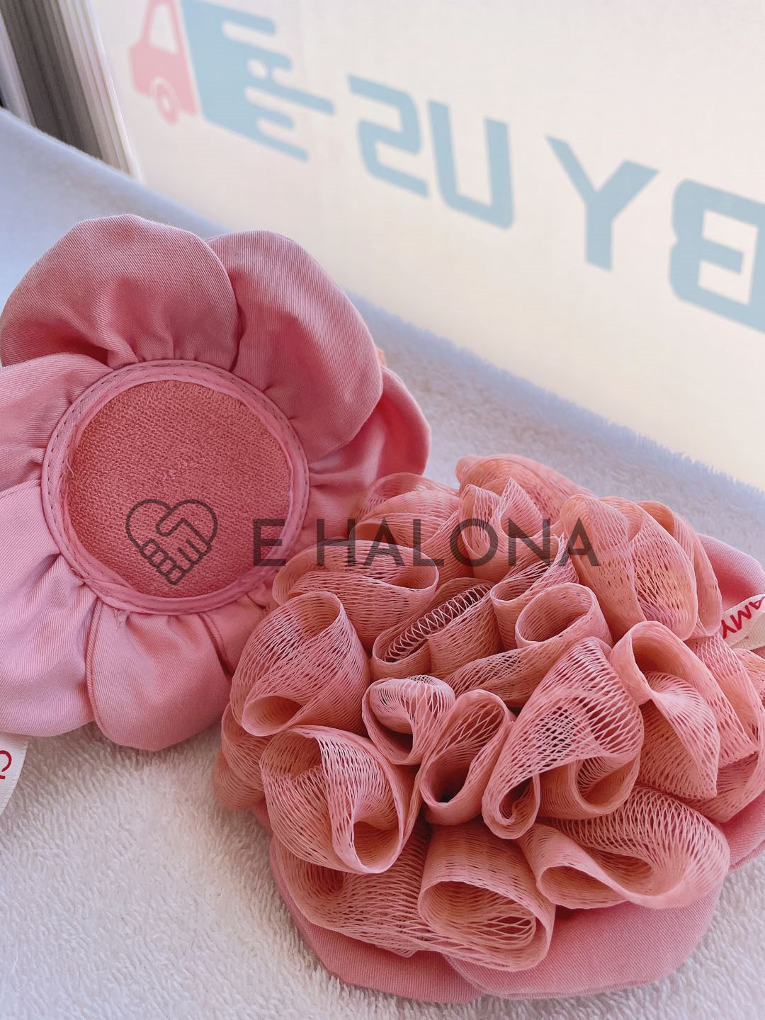 Bath lily puff lifestyle image in bathroom setting