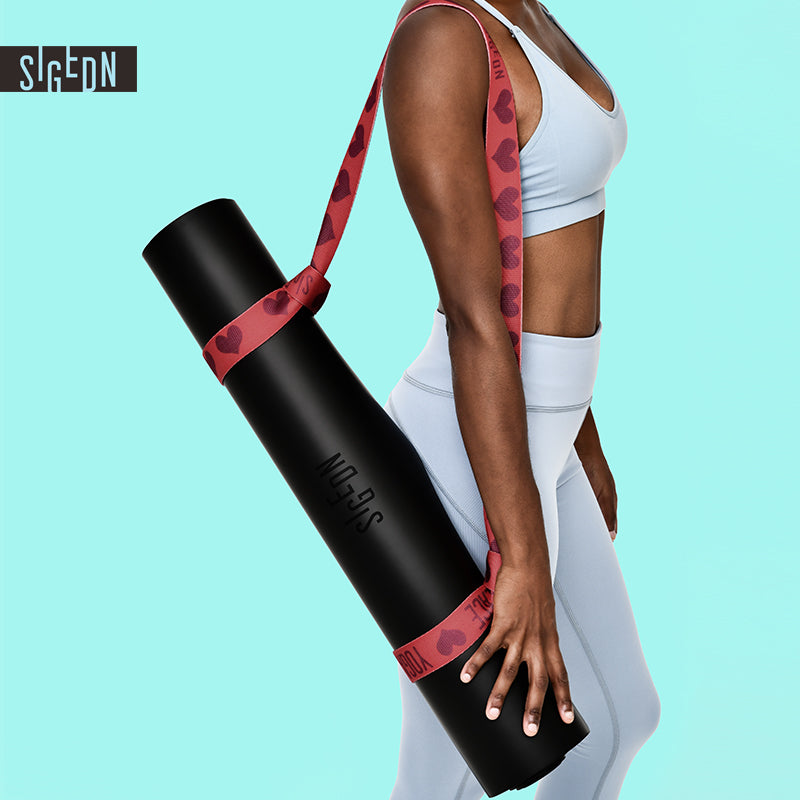 2-in-1 yoga strap for stretching and carrying a mat